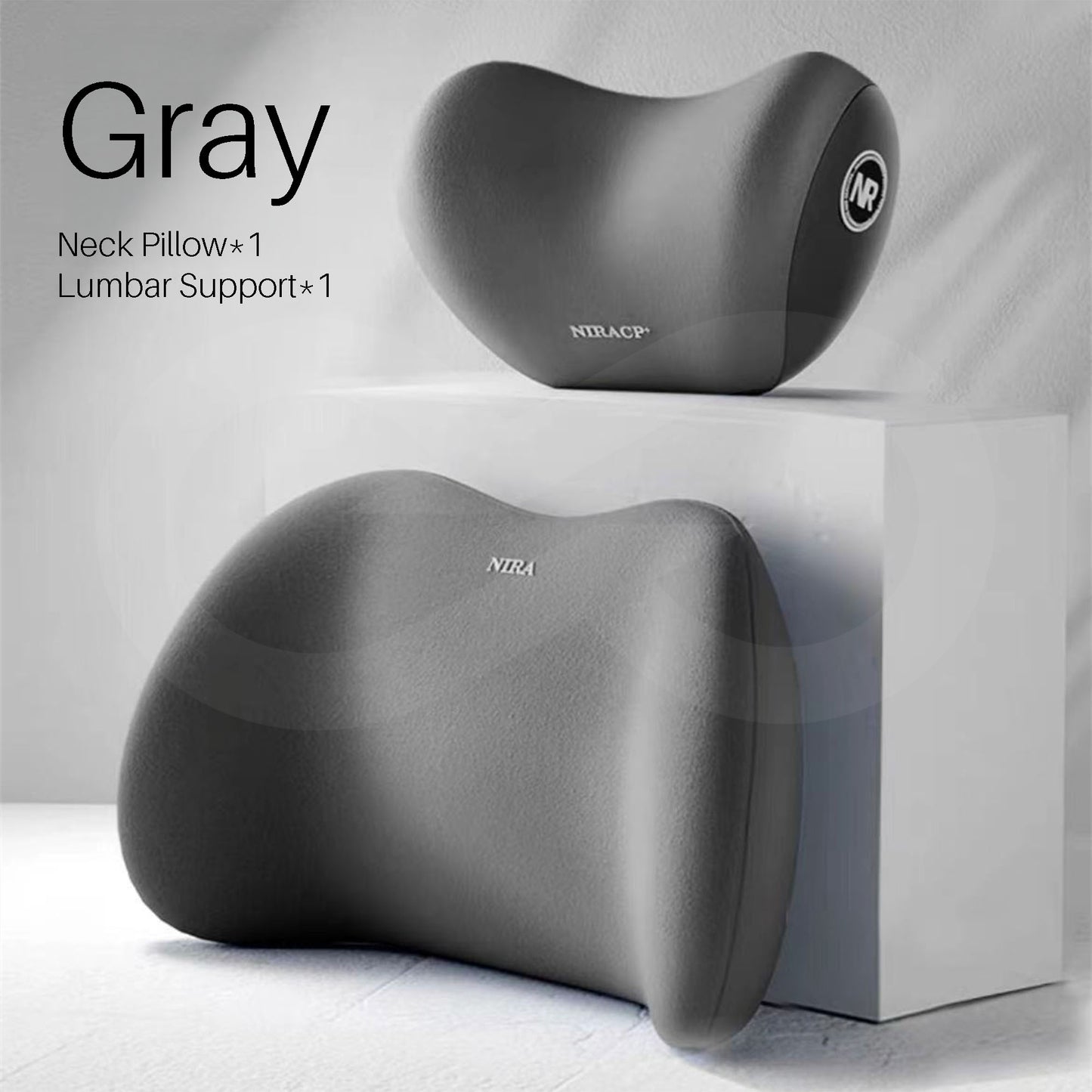 Gray color neck pillow and lumbar support on a white background.