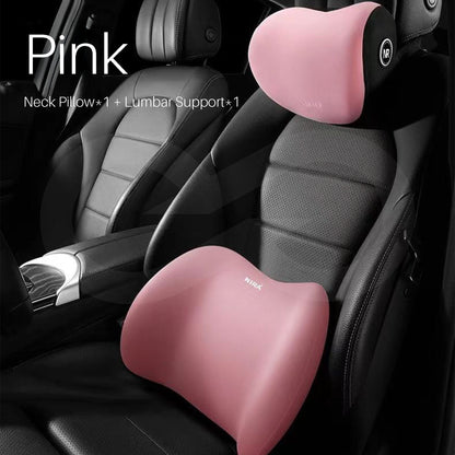 Pink color car neck pillow and lumbar support on a car seat.