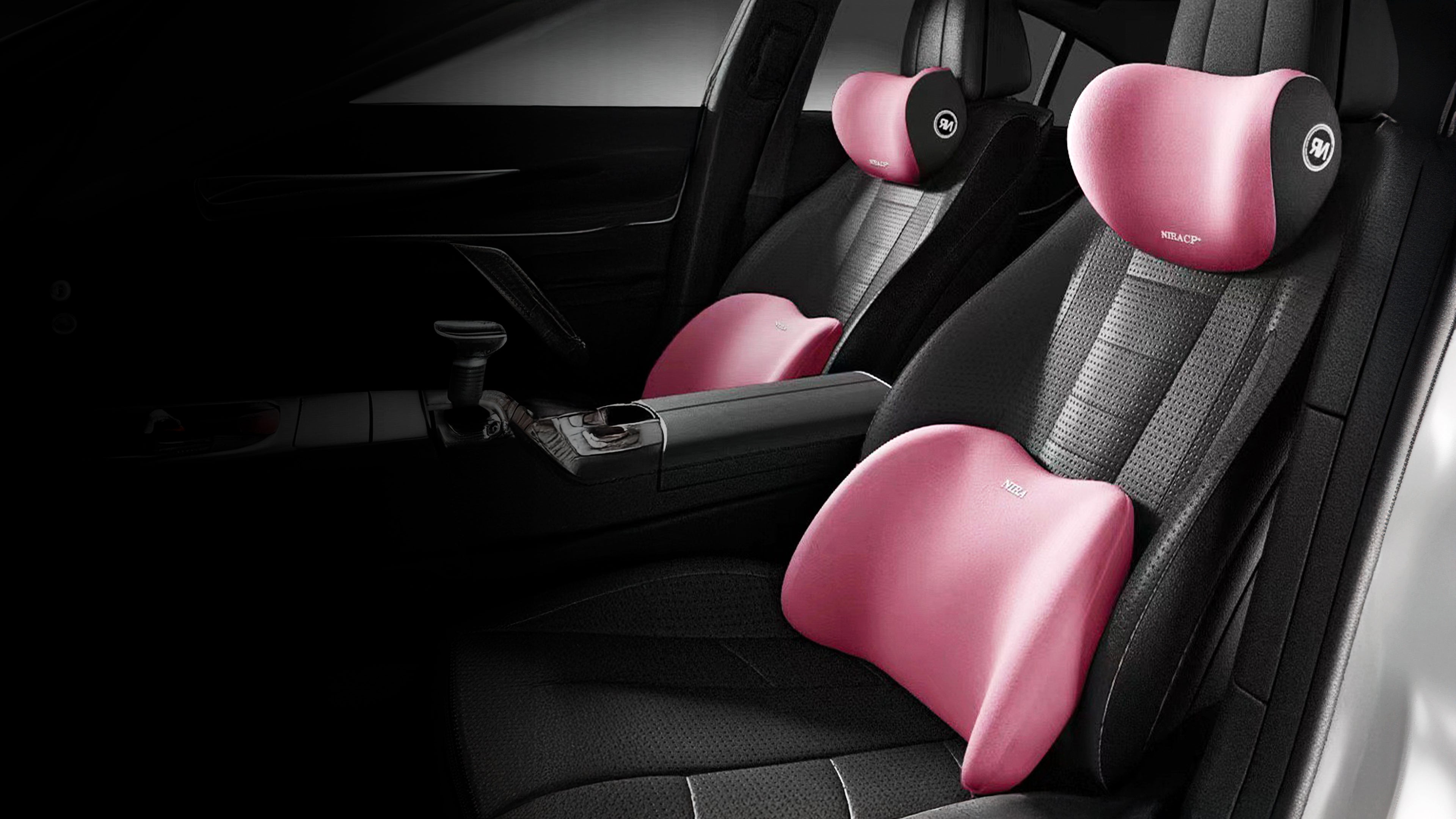 Pink 2-in-1 neck & lumbar support set on a black car seat