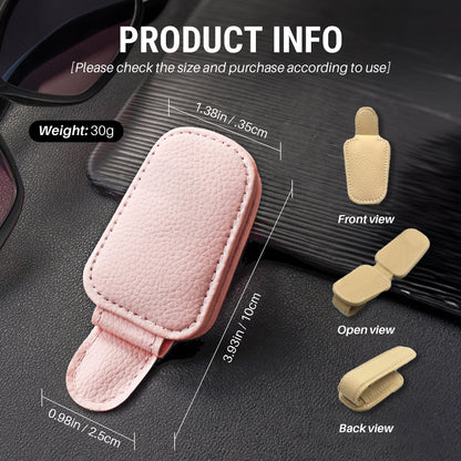 Pink leather car visor sunglasses clip with measurements and views on a dark surface