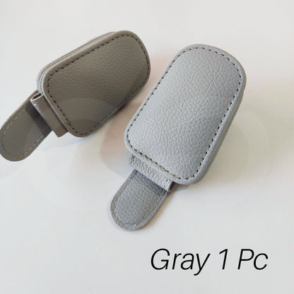 Gray car visor sunglasses clip