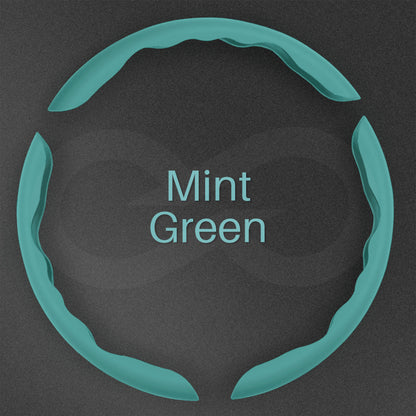 3 pieces mint green color Liquid Feel Steering Wheel Cover on a dark background