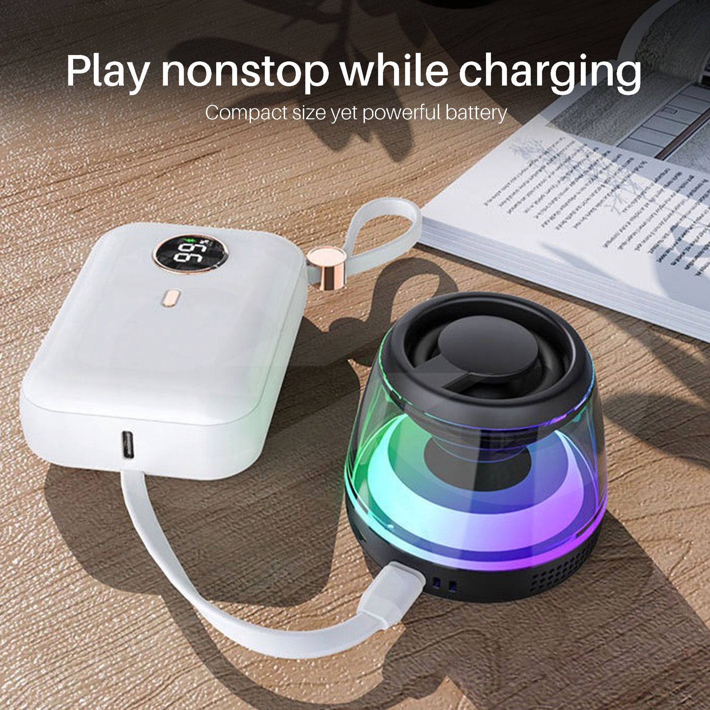 Portable speaker with charging cable on a wooden surface, text 'Play nonstop while charging' and 'Compact size yet powerful battery'.