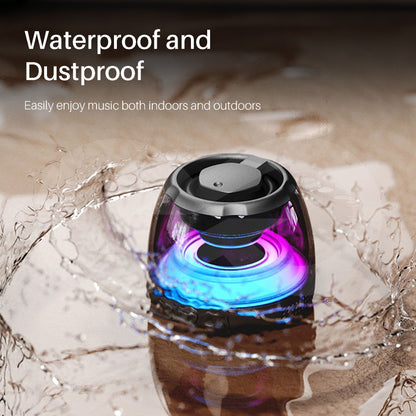 Waterproof and dustproof portable speaker with water splashing around it
