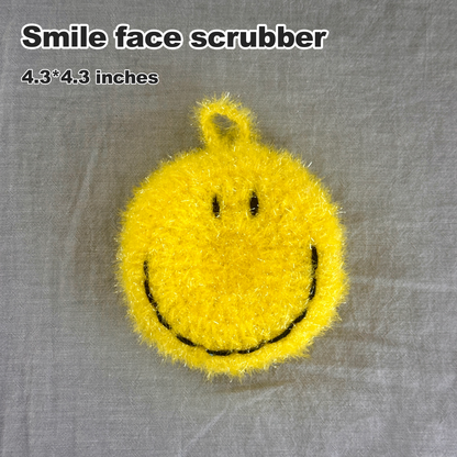 Yellow smile face scrubber on a gray background