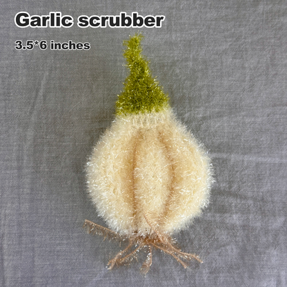 Garlic scrubber with green top on a gray background